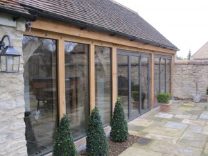 Oak framed garden room extension by Shires Oak Buildings