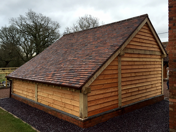 2 bay garage with catslide, rear elevation, by Shires Oak Buildings
