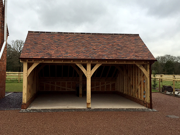 2 bay garage with open bays by Shires Oak Buildings