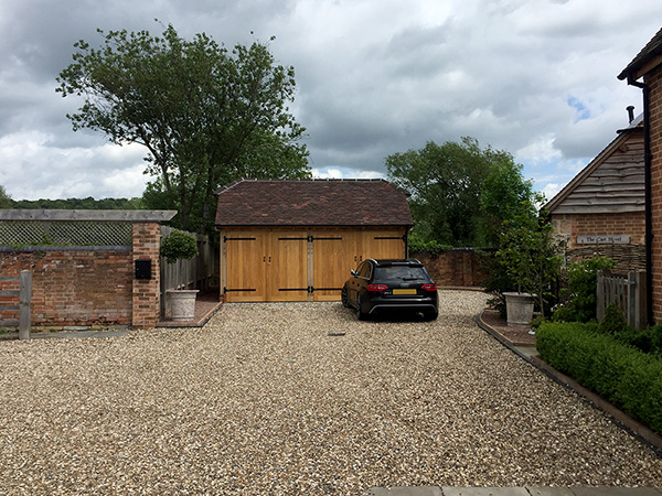 2 Bay garage with barn hip roof by Shires Oak Buildings